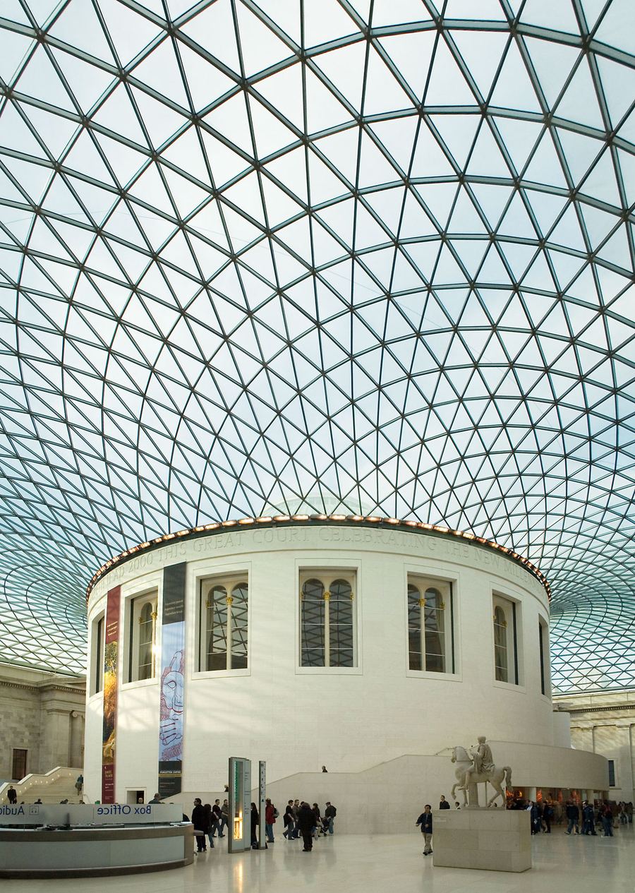 The glass roof of the Great Court at the British Museum, curving around the round Reading Room