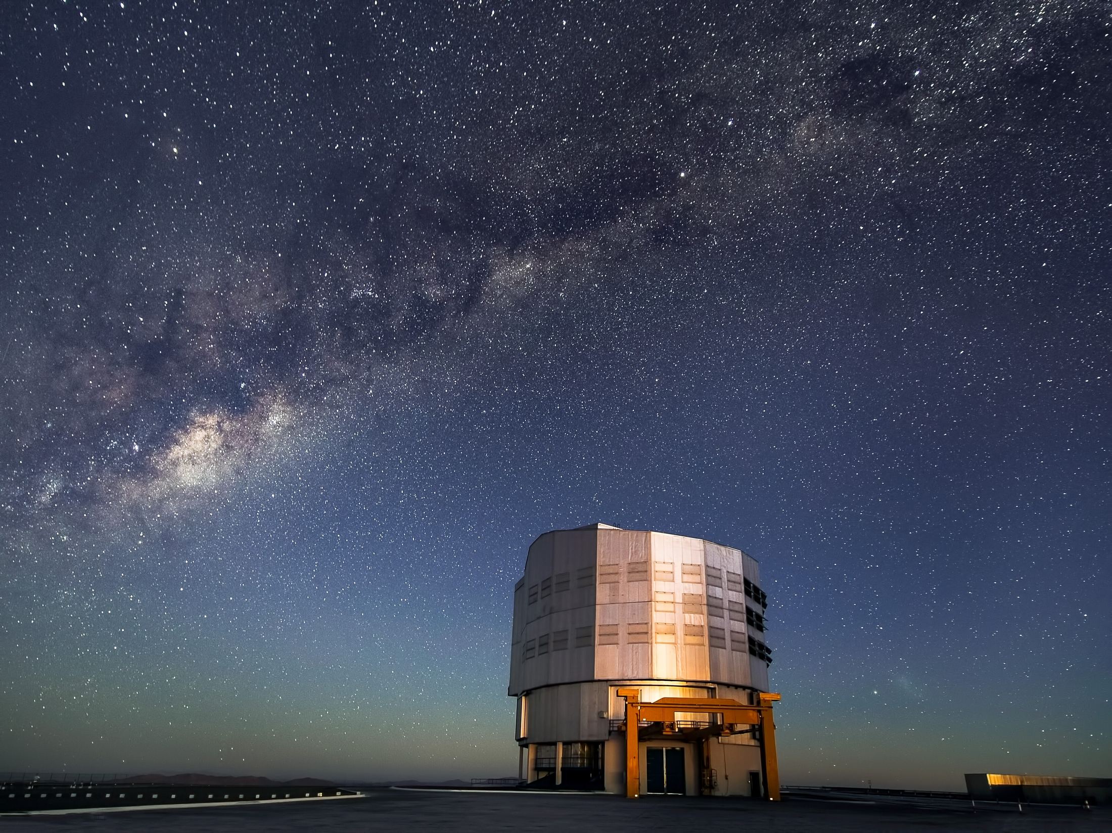 The Milky Way rising over a telescope dome at ESO's Paranal Observatory in Chile